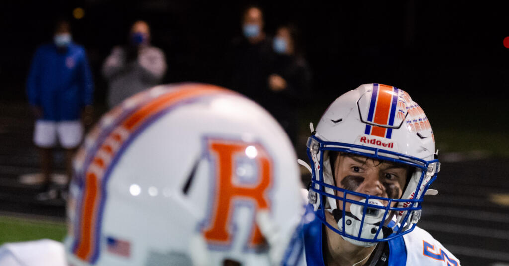 Ridgefield's Ty Snider readies to leap into the air after scoring a fourth-quarter touchdown in a 2A Greater St. Helens League football game on Friday, Oct. 1, 2021, at Fishback Stadium in Washougal. Ridgefield won 39-13.