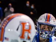 Ridgefield's Ty Snider readies to leap into the air after scoring a fourth-quarter touchdown in a 2A Greater St. Helens League football game on Friday, Oct. 1, 2021, at Fishback Stadium in Washougal. Ridgefield won 39-13.