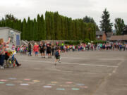 Woodland: Students and staff at North Fork Elementary School celebrate head custodian Ed Sorensen's retirement with a celebration tunnel.