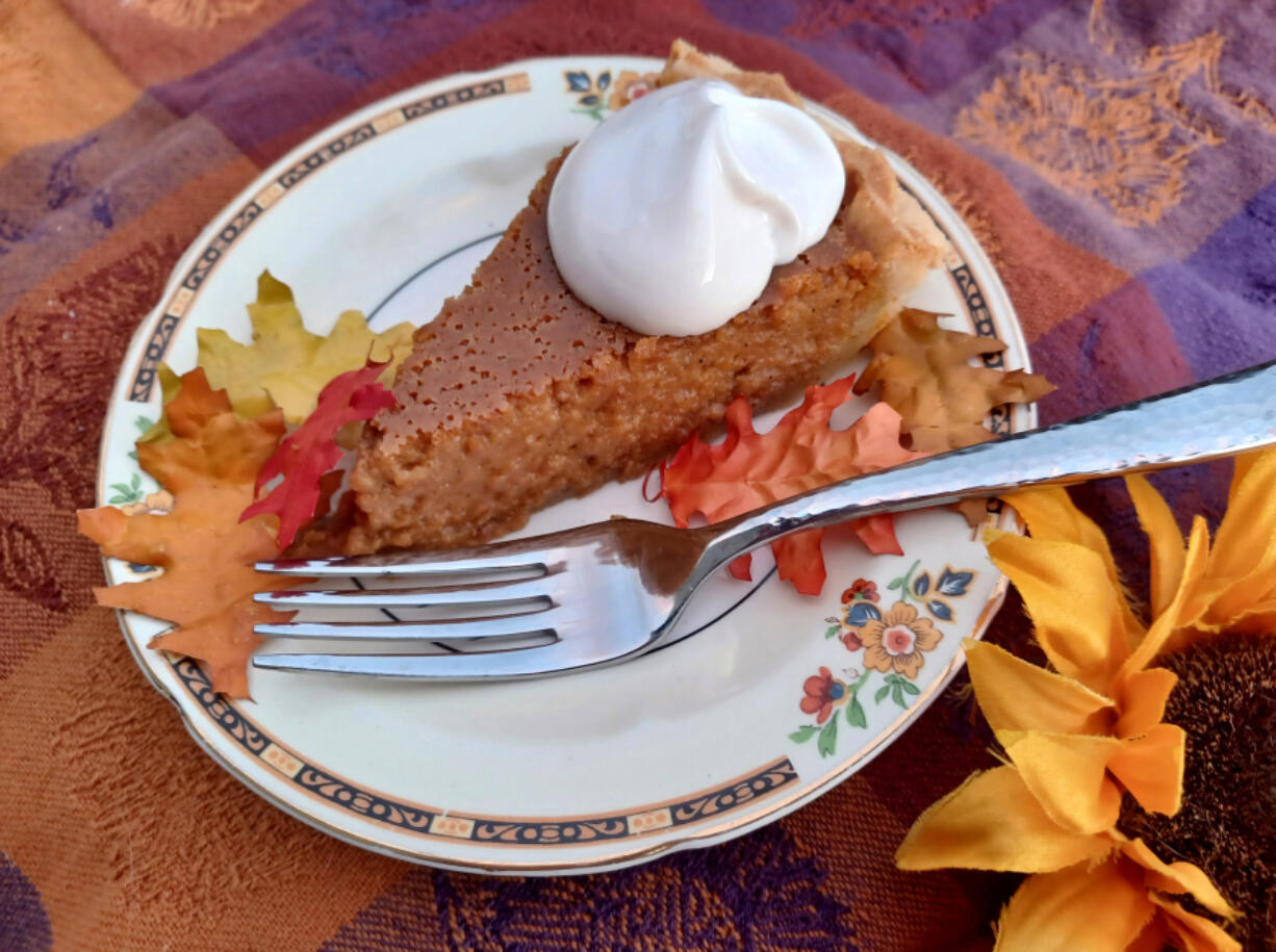 My mother's recipe for Louisiana Yam Pie includes instructions for a vanilla sour cream topping, a tart companion to the sweet pie.