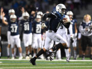 Skyview receiver Tanner Beaman runs to the end zone on a 38-yard scoring play against Union on Thursday as the Storm went on to win.