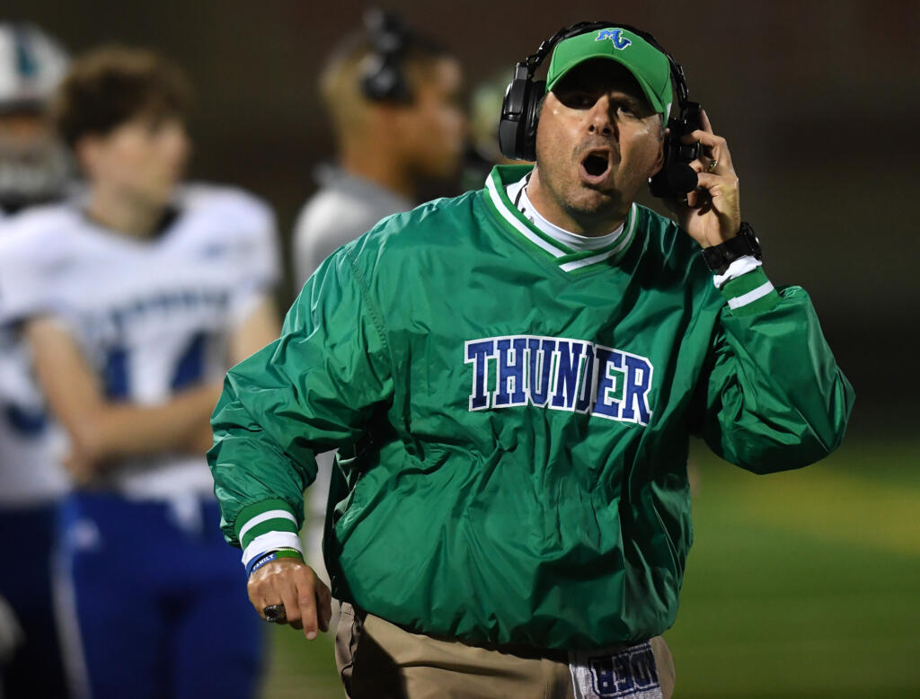 Mountain View head football coach Adam Mathieson yells toward the sideline Friday, Oct. 15, 2021, during the Thunder’s 17-14 win against Prairie at Battle Ground High School.