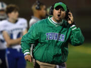 Mountain View head football coach Adam Mathieson yells toward the sideline Friday, Oct. 15, 2021, during the Thunder’s 17-14 win against Prairie at Battle Ground High School.