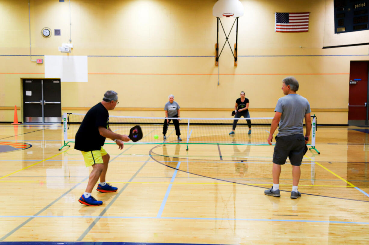 Community Education registrants test out Ridgefield's new indoor pickleball court.