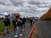 LEADOPTION Students host a march in support of the upcoming replacement levy for Battle Ground Public Schools on Wednesday afternoon. If the levy fails again, many students will lose extracurriculars and a variety of elective classes. "Extracurriculars are an outlet for students. They help create a sense of community," said Ethan Valtierra, a junior at Battle Ground High School involved in drama club and the baseball team.