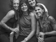 Photographer Lara Blair's work includes a portrait of Caffe Piccolo's barista Britteny Goodwin, left, owner Jodi Vaughan and baristas Meagan Rea and Allie Hotra.