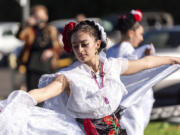 Marianna Cruz dances with other members of Vancouver Ballet Folklorico during a Dia de los Muertos celebration Oct. 30 at River City Church in Vancouver.