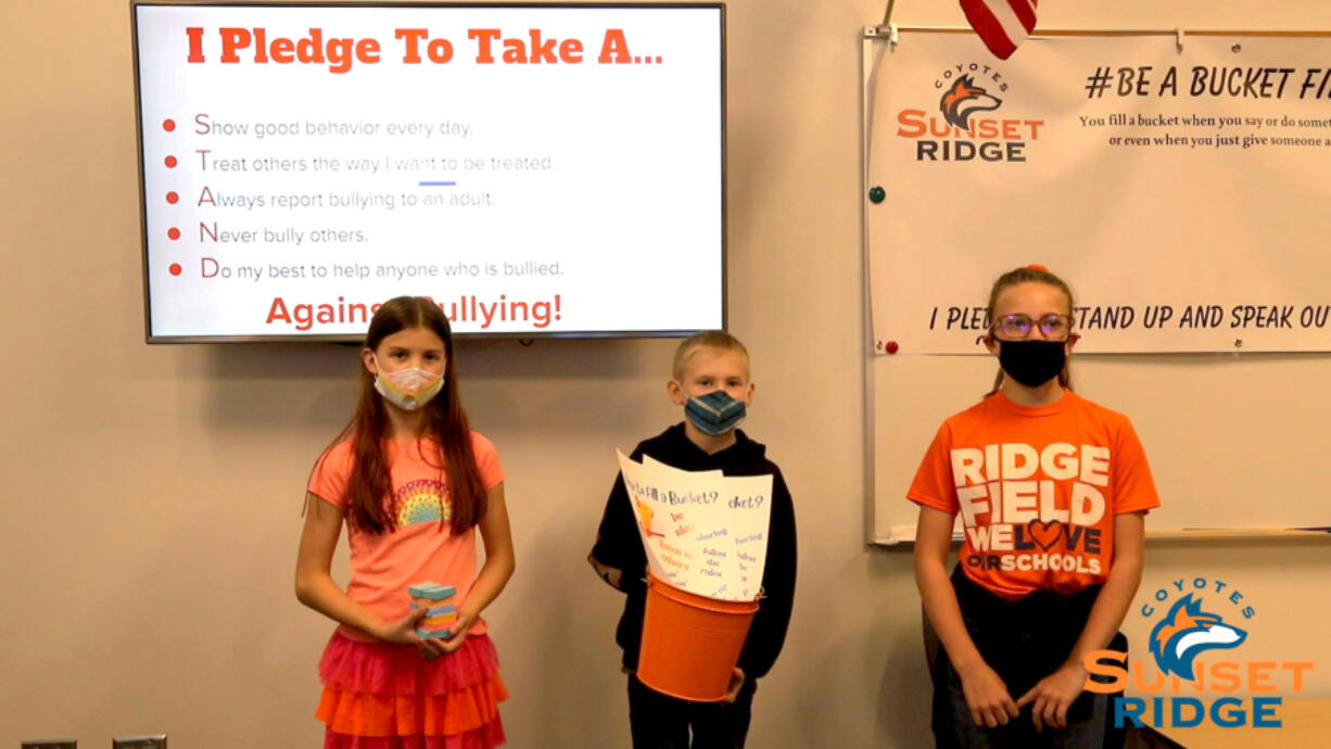 Sunset Ridge Intermediate School Leadership students shared information on the Pledge Posters and the Bucket Brigade.