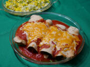 Chicken enchiladas with esquites (sauteed corn).