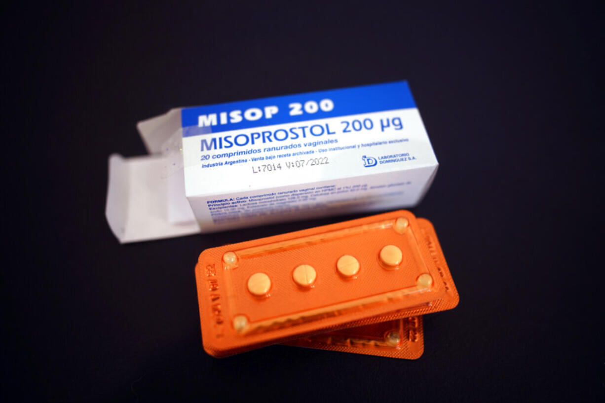 FILE - Misoprostol drug, the most common abortion pill, sits on a gynecological table at Casa Fusa, a health center that advises women on reproductive issues and performs legal abortions in Buenos Aires, Argentina, Friday, Jan. 22, 2021. Misoprostol empties the uterus by causing cramping and bleeding. The drugs are approved for use by the FDA up to 10 weeks of gestation. (AP Photo/Victor R.