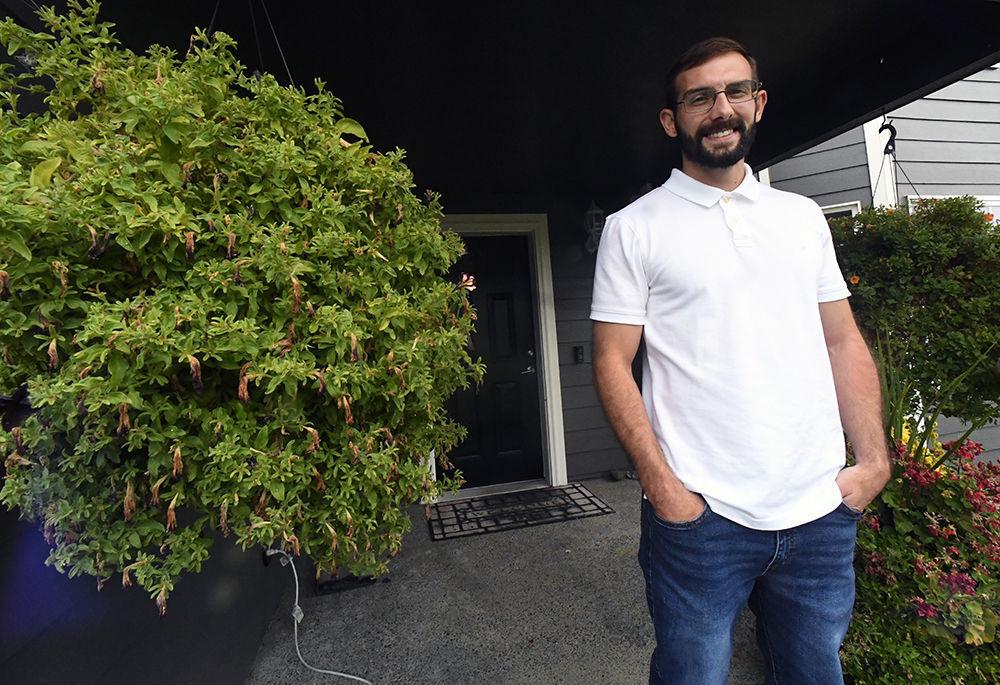 Bradley Gott, 30, stands on the front porch of his aunt's home Sept. 28 in Woodland. Gott has lived with his aunt since his March release from prison because he said he is unable to find rentals that accept ex-convicts.