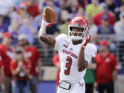 Eastern Washington quarterback Eric Barriere threw for 600 yards and seven touchdowns in a 71-14 win over Idaho on Saturday, Oct. 16, 2021..