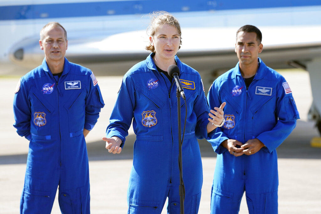 NASA astronaut Kayla Barron, a graduate of Richland High in Eastern Washington, center, answers questions during a news conference with astronauts Tom Marshburn, left, and Raja Chari after they arrived at the Kennedy Space Center in Cape Canaveral, Fla., Tuesday, Oct. 26, 2021. The mission with a crew of four astronauts will launch aboard a Crew Dragon spacecraft on a SpaceX Falcon 9 rocket from Kennedy Space Center Launch Complex 39A early Sunday morning to the International Space Station.