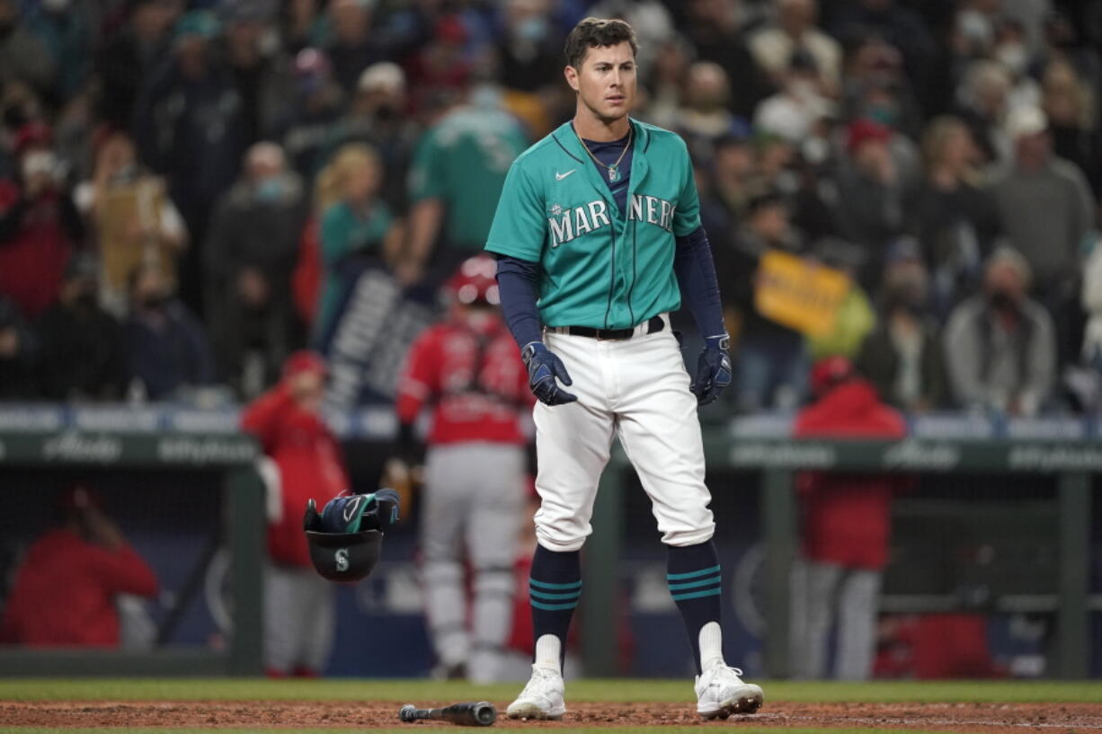 Dylan Moore reacts after being called out on strikes to end the 7th inning. (Ted S.