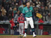 Dylan Moore reacts after being called out on strikes to end the 7th inning. (Ted S.