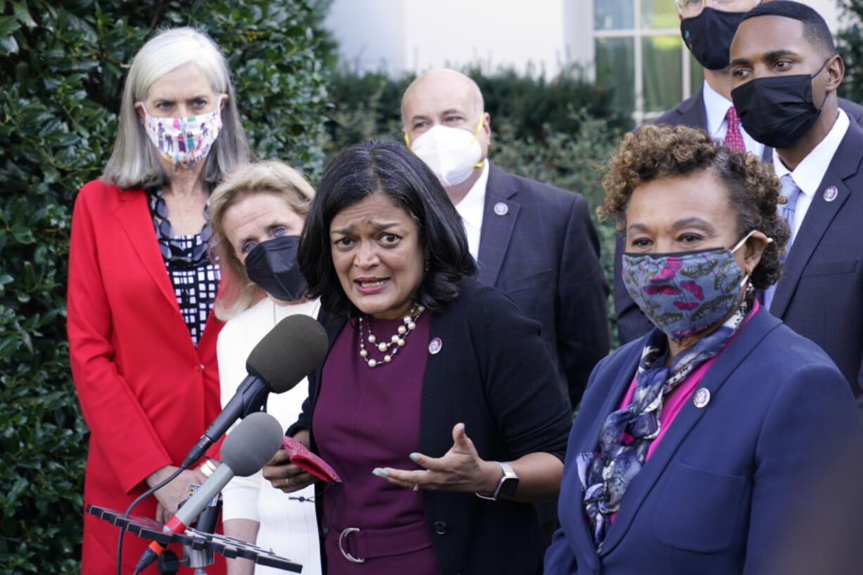 Rep. Pramila Jayapal, D-Wash., the chair of the Congressional Progressive Caucus, center, along with other lawmakers, talks with reporters outside the West Wing of the Washington, Tuesday, Oct. 19, 2021, following their meeting with President Joe Biden. Jayapal is joined by from left, Rep. Katherine Clark, D-Mass., Rep. Debbie Dingell, D-Mich., Rep. Mark Pocan, D-Wis., Rep. Barbara Lee, D-Calif., and Rep. Ritchie Torres, D-New York.