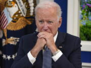 President Joe Biden listens during a meeting with business leaders about the debt limit in the South Court Auditorium on the White House campus, Wednesday, Oct. 6, 2021, in Washington.