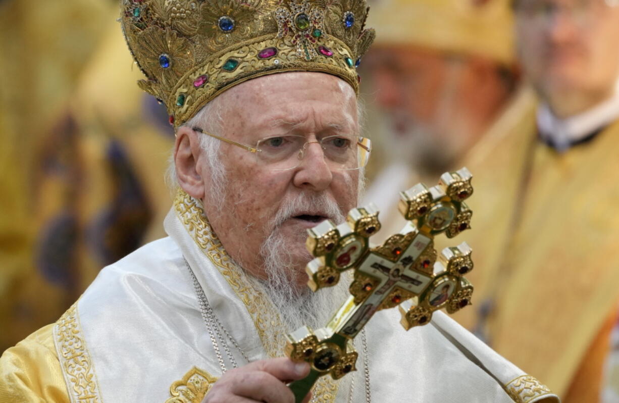 FILE - In this Sunday, Aug. 22, 2021 file photo, Ecumenical Patriarch Bartholomew I, the spiritual leader of the world's Orthodox Christians, leads a Mass at the St. Sofia Cathedral in Kyiv, Ukraine. Bartholomew I, the spiritual leader of Eastern Orthodox Christians, has been released from a Washington hospital after an overnight stay early in his 12-day visit to the United States.