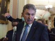 Sen. Joe Manchin, D-W.Va., speaks with reporters on Capitol Hill, Thursday, Oct. 7, 2021, in Washington.