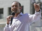 FILE - In this March 14, 2017, file photo Dilawar Syed, president of the software company Freshdesk, speaks during a Tech Stands Up rally outside City Hall in Palo Alto, Calif. If Syed is confirmed as deputy administrator of the Small Business Administration, he will be the highest-ranking Muslim in U.S. government.