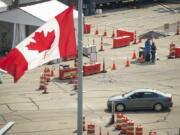 A car crosses the border into Canada, in Niagara Falls, Ontario, on Aug. 9.