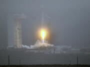 A United Launch Alliance Atlas V rocket lifts off carrying the Landsat 9 earth imaging satellite from Vandenberg Space Force Base, Calif., on Monday, Sept. 27, 2021. It is the latest in a series of U.S. satellites that has recorded human and natural impacts on Earth's surface for decades.