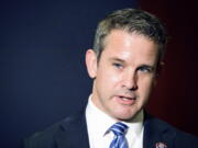 FILE - Rep. Adam Kinzinger, R-Ill., speaks to the media at the Capitol, May 12, 2021, in Washington. Kinzinger a critic of Donald Trump who is one of two Republicans on the panel investigating the deadly Capitol attack, announced Friday, Oct. 29, that he will not seek re-election next year.