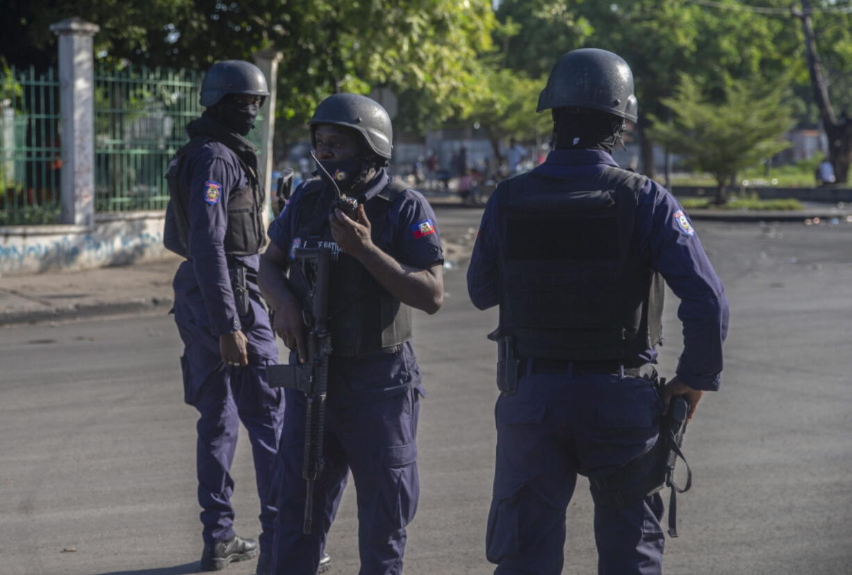 Armed forces secure the area where the Haiti's Prime Minister Ariel Henry placed a bouquet of flowers in front of independence hero Jean Jacques Dessalines memorial in Port-au-Prince, Haiti, Sunday, Oct. 17, 2021. A group of 17 U.S. missionaries including children was kidnapped by a gang in Haiti on Saturday, Oct. 16, according to a voice message sent to various religious missions by an organization with direct knowledge of the incident.