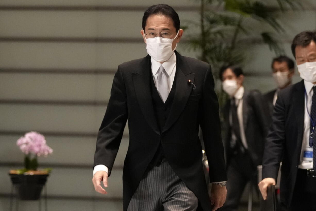 Japanese Prime Minister Fumio Kishida arrives at the prime minister's official residence after he and his ministers attended the attestation ceremony of his cabinet at the Imperial Palace Monday, Oct. 4, 2021, in Tokyo. Japan's parliament on Monday elected Kishida, a former moderate turned hawk, as prime minister.