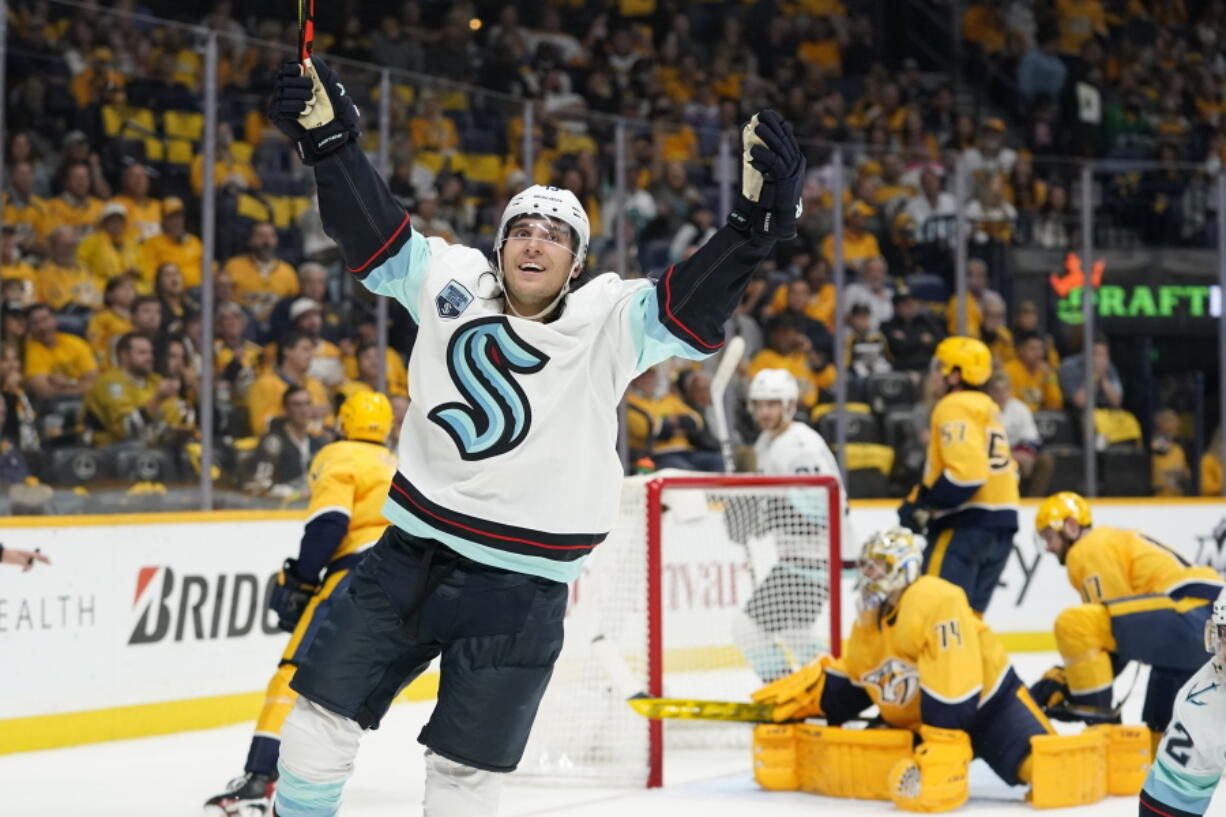 Seattle Kraken left wing Brandon Tanev celebrates after scoring a goal against the Nashville Predators in the first period of an NHL hockey game Thursday, Oct. 14, 2021, in Nashville, Tenn.