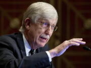 FILE - Dr. Francis Collins, director of the National Institutes of Health, appears before a Senate Health, Education, Labor and Pensions Committee hearing to discuss vaccines and protecting public health during the coronavirus pandemic on Capitol Hill, on Wednesday, Sept. 9, 2020, in Washington. Collins says he is stepping down by the end of the year, having led the research center for 12 years and becoming a prominent source of public information during the coronavirus pandemic. A formal announcement was expected Tuesday, Oct. 5, 2021 from NIH.