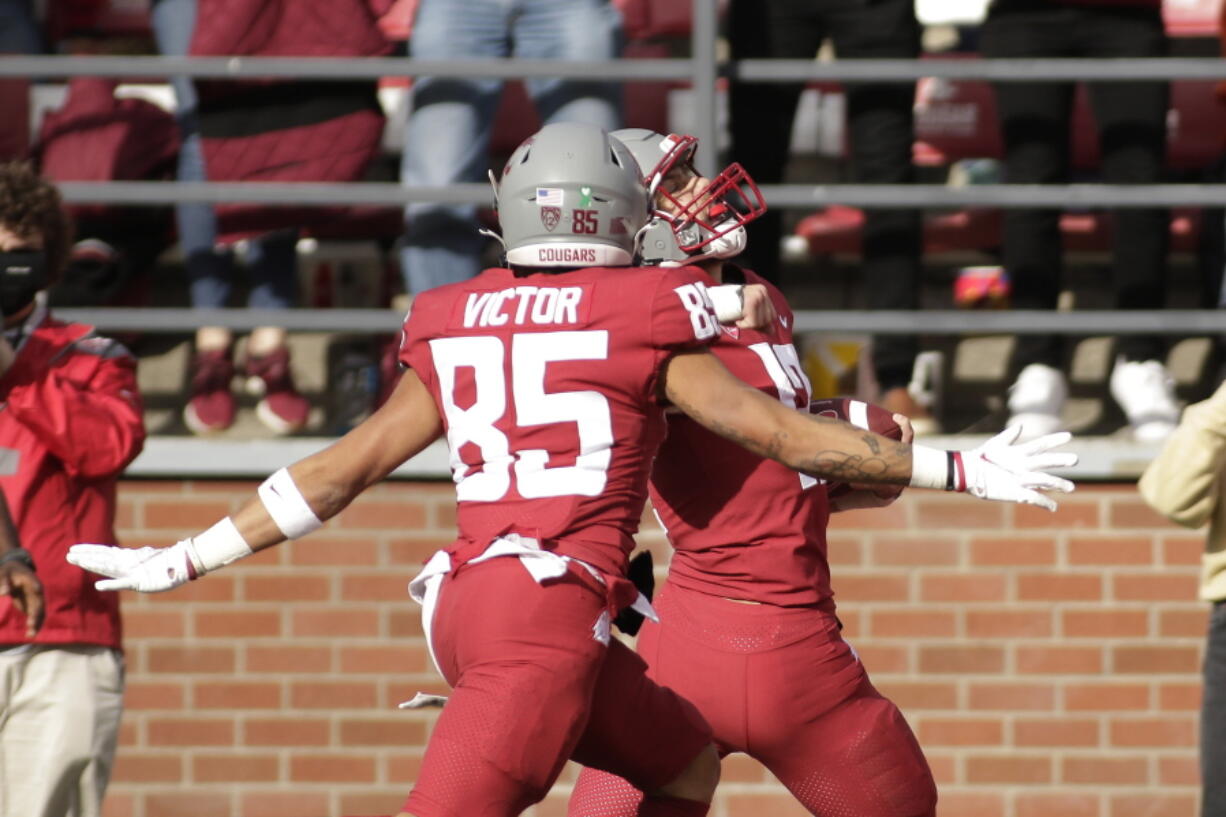 Washington State wide receiver Joey Hobert, right, celebrates as he runs for a touchdown, with wide receiver Lincoln Victor, a Union High grad, during the second half against Oregon State, Saturday, Oct. 9, 2021, in Pullman. Washington State won 31-24.