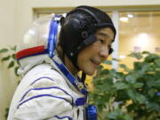 Space flight participant Yusaku Maezawa attends a training session ahead of the expedition to the International Space Station at the Gagarin Cosmonauts' Training Center in Star City outside Moscow, Russia, Thursday, Oct. 14, 2021. A Japanese fashion tycoon who's booked a SpaceX ride to the moon is going to try out the International Space Station first. Yusaku Maezawa announced that he's bought two seats on a Russian Soyuz capsule. He'll blast off in December on the 12-day mission with his production assistant and a professional cosmonaut.