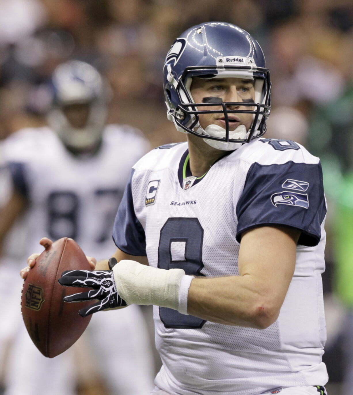 Seattle Seahawks quarterback Matt Hasselbeck looks for a receiver during the second half of an NFL football game against the New Orleans Saints at the Louisiana Superdome in New Orleans, Sunday, Nov. 21, 2010. Hasselbeck seems to hold sharper memories of the tougher times during his long tenure in Seattle than the moments when the Seahawks experienced success. The tougher moments seem to be the ones that have resonated. But that also makes Hasselbeck appreciate the successes he had during his 10 years as quarterback and moments such as Monday, Oct. 25, 2021 when he will be inducted into the Seahawks "Ring of Honor" at halftime of Seattle's matchup with New Orleans.