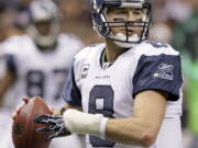 Seattle Seahawks quarterback Matt Hasselbeck looks for a receiver during the second half of an NFL football game against the New Orleans Saints at the Louisiana Superdome in New Orleans, Sunday, Nov. 21, 2010. Hasselbeck seems to hold sharper memories of the tougher times during his long tenure in Seattle than the moments when the Seahawks experienced success. The tougher moments seem to be the ones that have resonated. But that also makes Hasselbeck appreciate the successes he had during his 10 years as quarterback and moments such as Monday, Oct. 25, 2021 when he will be inducted into the Seahawks "Ring of Honor" at halftime of Seattle's matchup with New Orleans.