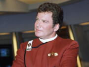 FILE - In this 1988 file photo, William Shatner, who portrays Capt. James T. Kirk, attends a photo opportunity for the film "Star Trek V: The Final Frontier." The performer who breathed life into Kirk is, at age 90, heading toward the stars under dramatically different circumstances than his fictional counterpart when Shatner boards Jeff Bezos' Blue Origin NS-18.