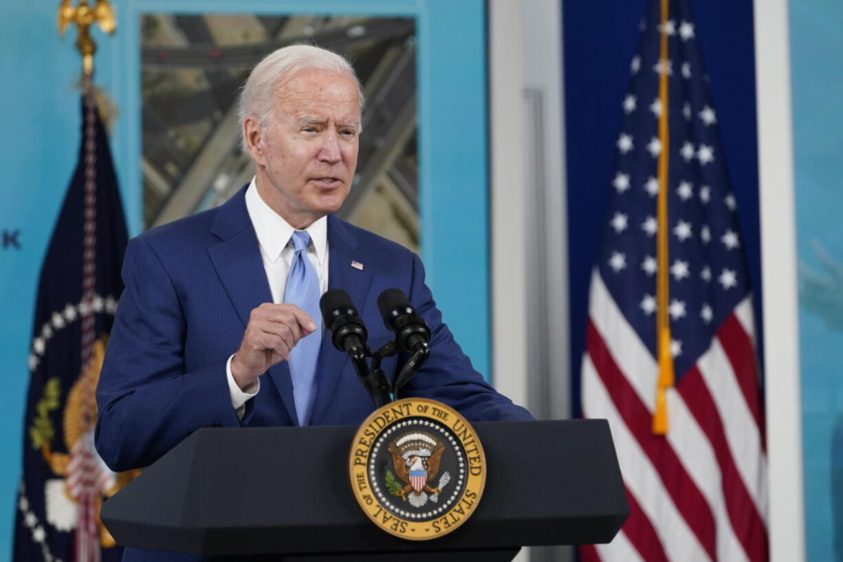 FILE - In this Oct. 8, 2021, file photo President Joe Biden speaks about the September jobs report from the South Court Auditorium on the White House campus in Washington. Biden is set to hold his first bilateral talks as president with an African leader on Thursday, hosting Kenyan President Uhuru Kenyatta as war and a humanitarian crisis roil neighboring Ethiopia, according to the White House.