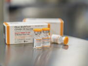 FILE - This October 2021, photo provided by Pfizer shows kid-size doses of its COVID-19 vaccine in Puurs, Belgium. The U.S. moved a step closer to expanding vaccinations for millions more children as a panel of government advisers on Tuesday, Oct. 26, endorsed kid-size doses of Pfizer's shots for 5- to 11-year-olds.