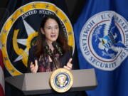 FILe - Director of National Intelligence Avril Haines introduces President Joe Biden during a visit to the Office of the Director of National Intelligence in McLean, Va., on July 27, 2021. U.S. intelligence agencies say they likely won't ever be able to conclude whether COVID-19 spread by animal-to-human transmission or leaked from a lab. The Director of National Intelligence issued a paper Friday, Oct. 29, that elaborates on findings released in August of a 90-day review ordered by Biden.