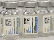 FILE - This Saturday, March 6, 2021, file photo shows vials of Johnson & Johnson COVID-19 vaccine at a pharmacy in Denver. Johnson & Johnson has asked U.S. regulators to allow booster shots of its COVID-19 vaccine as the U.S. government moves toward shoring up protection in more vaccinated Americans. J&J said Tuesday, Oct. 5, 2021, it filed data with the Food and Drug Administration on giving a booster dose between two to six months after vaccination.