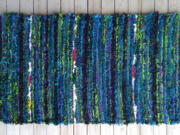 Washougal artist Kathy Marty creates a rug using Pendleton Woolen Mills scraps on her home loom.