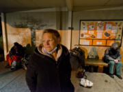 Shelter client Tonya Johnson waits for the Satellite Overflow Shelter at Immanuel Lutheran Church to open on Nov. 19. Johnson grew up in Clark County. She attended Battle Ground High School and Clark College and was a special education teacher for more than 20 years. But a series of tragic events left her without a safety net. She's been living on the streets since August.