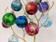 Alcohol Inks Ornaments: Vancouver Art Space offers several workshops featuring alcohol inks, a permanent ink that adheres to smooth surfaces like ceramic, metal and these glass ornaments.