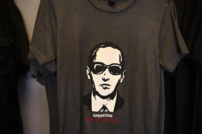 D.B. Cooper T-shirts are on sale at NW Escape Experience. "What a rock-and-roll move," owner Robert Bertrand said of Cooper's airborne crime and escape.