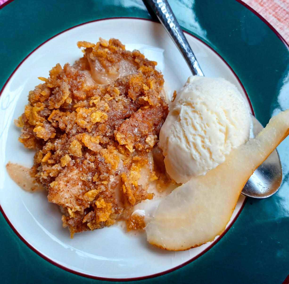 Sweet baked pears with a crispy cornflake topping are a delicious way to enjoy this autumn fruit.