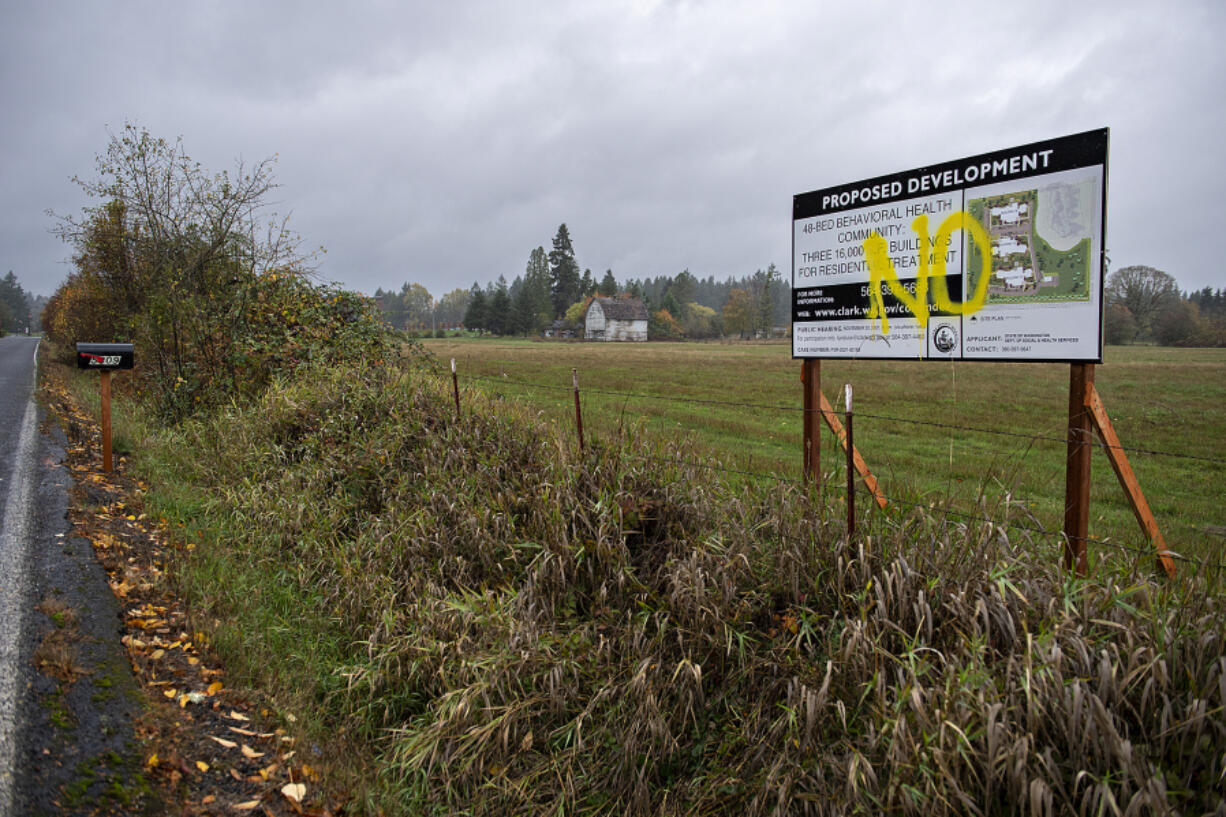 A sign for a proposed behavioral health facility is pictured in Salmon Creek on Thursday afternoon, Nov. 4, 2021.