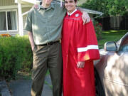 Damien Wheeler and his longtime friend and mentor, Shawn Hamburg, celebrate Wheeler's graduation together.