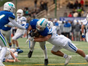 Mountain View's CJ Hamblin muscles his way into the end zone for a 3-yard touchdown run in a 3A State preliminary game on Saturday, Nov. 6, 2021, at McKenzie Stadium. Seattle Prep defeated Mountain View 38-27 to end the Thunder season.