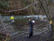 Hood River fishermen Eli Schroppel, left, and Matt Sweeting hope to get a bite as they fish in the White Salmon River.