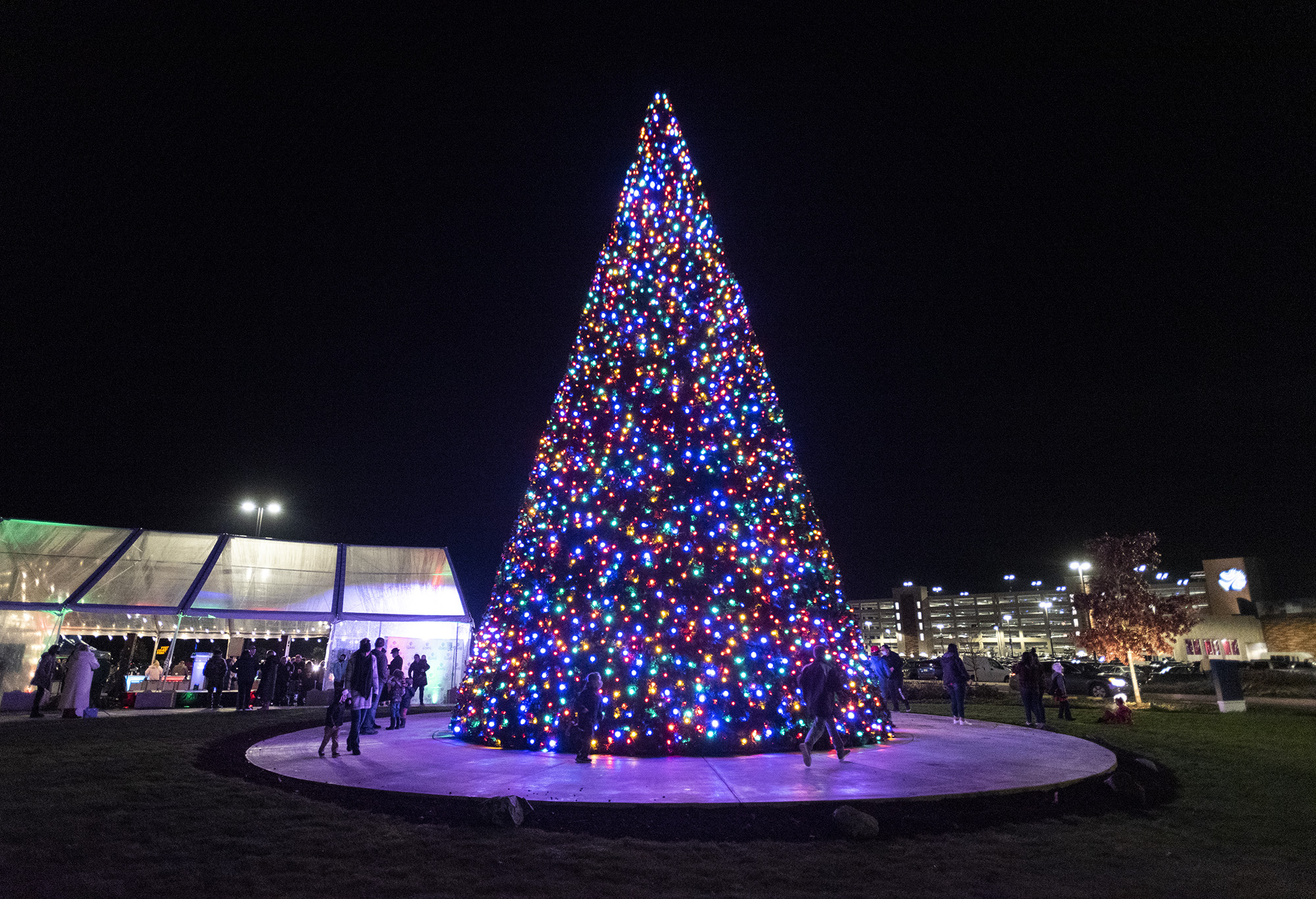 People mill around a 50-foot Christmas Tree on Wednesday, Nov. 24, 2021, at a tree lighting event at ilani Casino Resort in Ridgefield.